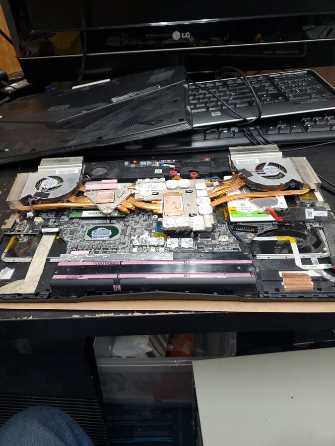 Laptop opened for hardware diagnosis and repair