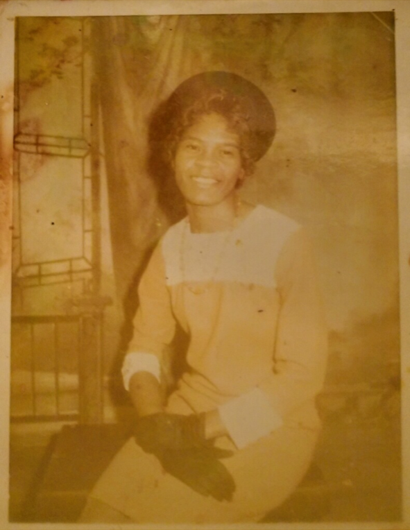 Original faded family photograph before restoration