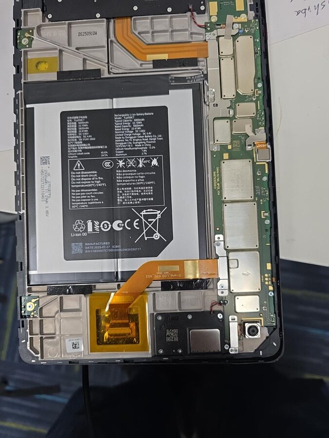 Tablet opened for internal repair